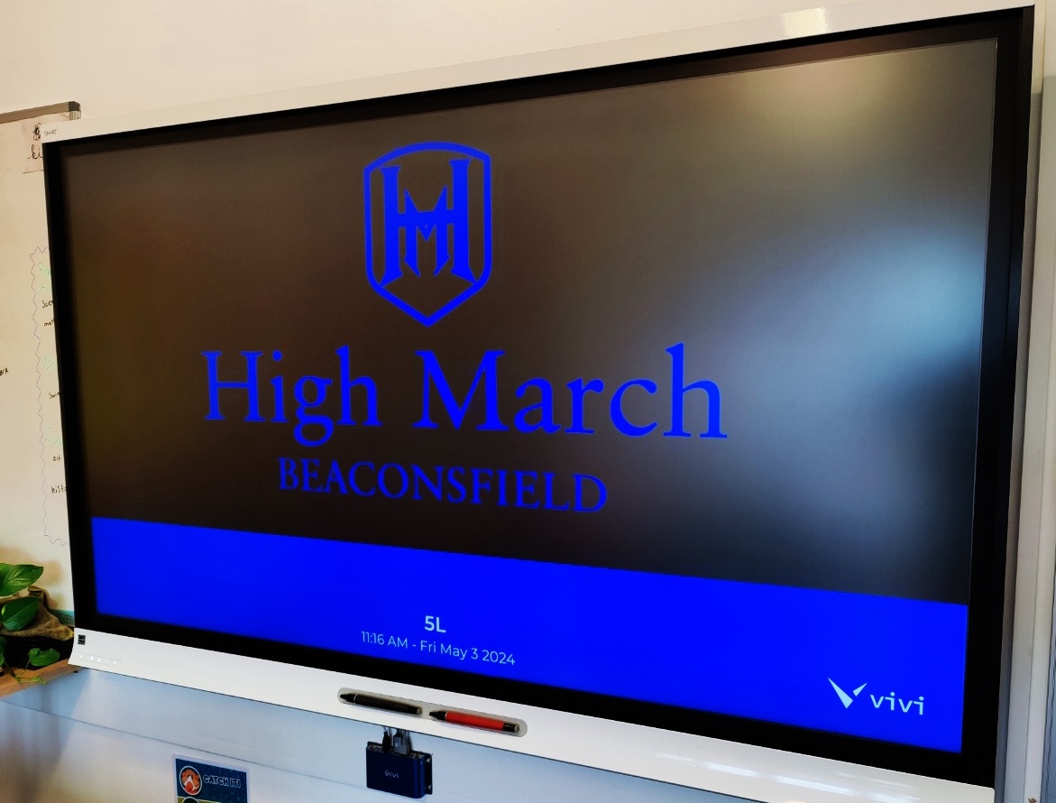 High March logo is displayed on a Vivi connected display in a classroom.