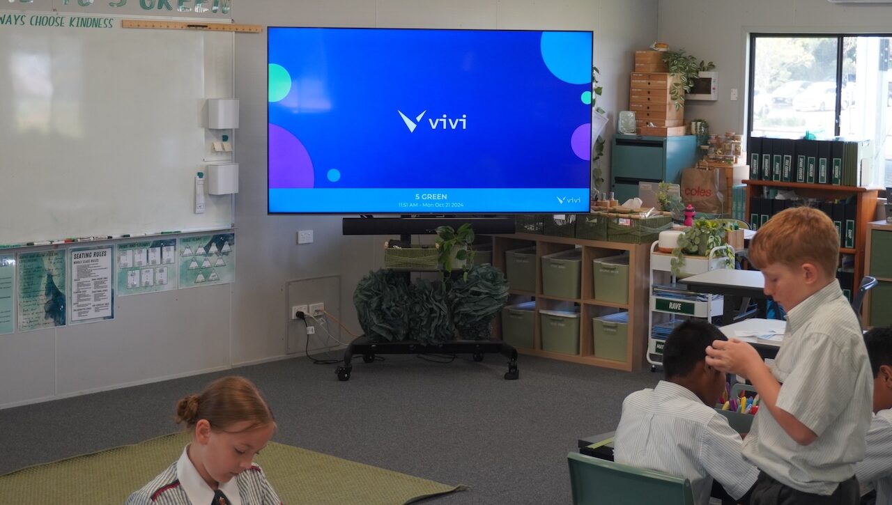 Classroom with Vivi displayed on screen.